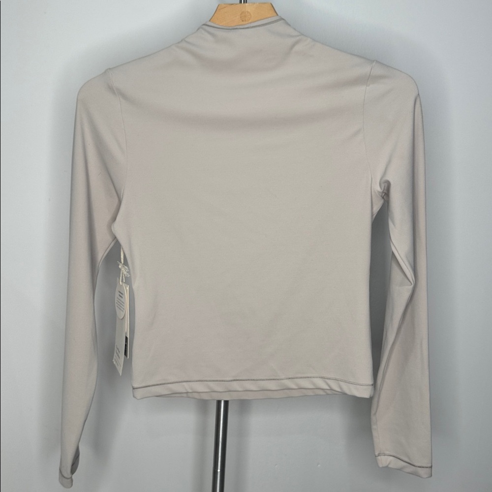 NWT Vuori AllTheFeels™ Long Sleeve Mock Neck Top • Cream • XS - Picture 12 of 14